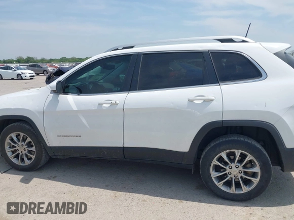 2019 Jeep Cherokee Latitude Plus with VIN 1C4PJLLBXKD220221, listed as a IAAI auction lot 42060125 with 89,452 mi miles and . Bid and sale history available at DreamBid. Image 14.