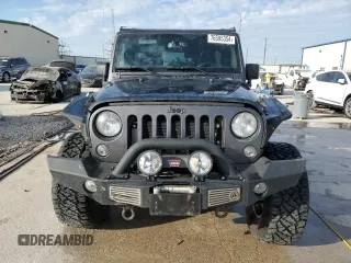 2018 Jeep Wrangler JK Unlimited Sport S with VIN 1C4BJWDG8JL812324, listed as a Copart auction lot 76595354 with 140,013 mi miles and Salvage Title. Bid and sale history available at carsss.com. Image 5.