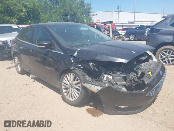 2015 Ford Focus Titanium with VIN 1FADP3J24FL385526, listed as a IAAI auction lot 42011712 with 162,696 mi miles and . Bid and sale history available at carsss.com. Image 1.