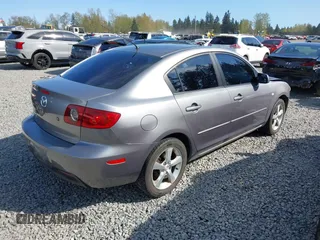 2006 Mazda 3 i with VIN JM1BK12F461530369, listed as a IAAI auction lot 41990008 with 169,878 mi miles. Bid and sale history available at carsss.com. Image 4.