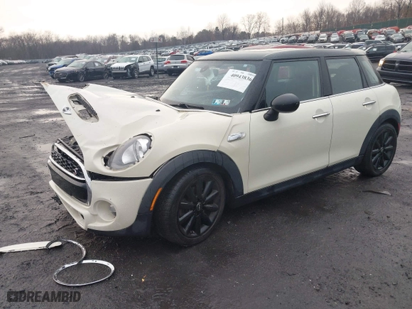 2015 MINI Cooper Hardtop 4 Door S with VIN WMWXU3C55F2B62067, listed as a IAAI auction lot 40943836 with 126,896 mi miles. Bid and sale history available at carsss.com. Image 17.