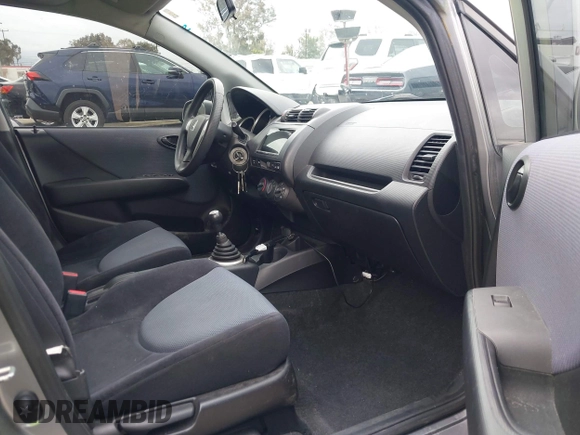 2007 Honda Fit with VIN JHMGD37467S065669, listed as a IAAI auction lot 42078795 with 124,030 mi miles. Bid and sale history available at carsss.com. Image 5.