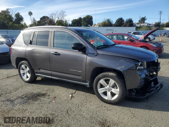 2015 Jeep Compass Sport with VIN 1C4NJCBB5FD377329, listed as a Copart auction lot 86545484 with 112,380 mi miles and Salvage Title. Bid and sale history available at carsss.com. Image 4.