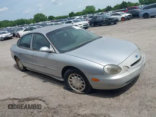 1996 Ford Taurus LX with VIN 1FALP53S6TA159662, listed as a IAAI auction lot 42447776 with 228,083 mi miles and . Bid and sale history available at DreamBid. Image 1.
