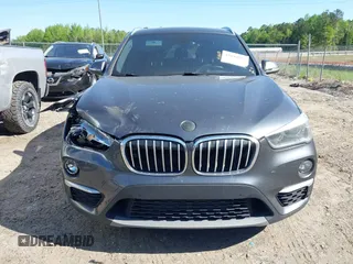 2017 BMW X1 xDrive28i with VIN WBXHT3C31H5F80056, listed as a IAAI auction lot 42049925 with 64,471 mi miles and . Bid and sale history available at DreamBid. Image 12.