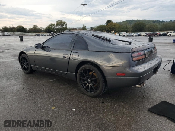 1990 Nissan 300ZX z VIN JN1RZ24A2LX013102, wystawiony jako Copart lot #73137144 z przebiegiem 147 952 mil mil oraz Szkody całkowita. Historia ofert i sprzedaży dostępna na DreamBid. Obrazek 2.