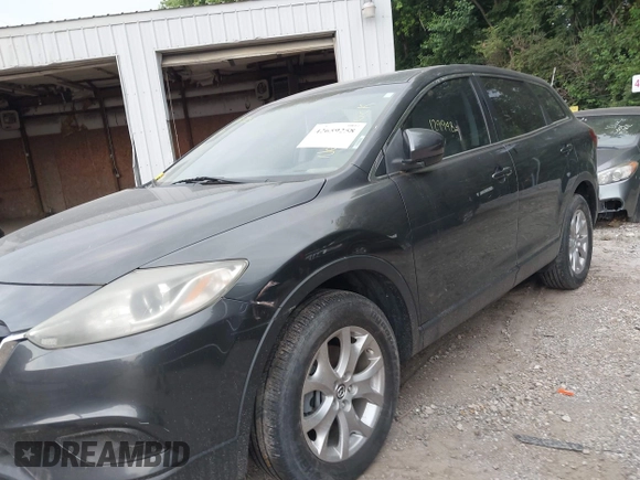2015 Mazda CX-9 Touring with VIN JM3TB2CA5F0452775, listed as a IAAI auction lot 42659258 with 129,948 mi miles and . Bid and sale history available at DreamBid. Image 6.