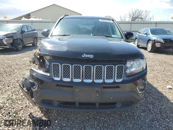 2016 Jeep Compass High Altitude Edition with VIN 1C4NJDEB0GD772702, listed as a Copart auction lot 52634105 with 74,494 mi miles and Salvage Title. Bid and sale history available at carsss.com. Image 5.