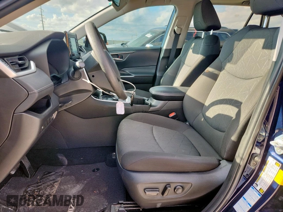 2022 Toyota RAV4 Hybrid XLE with VIN 2T3RWRFV0NW138427, listed as a Copart auction lot 60860815 with 27,772 mi miles and Salvage title. Bid and sale history available at DreamBid. Image 7.