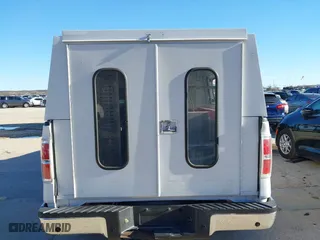 2014 Ford F-150 XL with VIN 1FTMF1CM0EKG22856, listed as a IAAI auction lot 41677979 with 158,580 mi miles. Bid and sale history available at carsss.com. Image 15.
