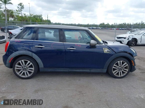 2017 MINI Hardtop 4 Door Cooper with VIN WMWXU1C54H2E19114, listed as a IAAI auction lot 42107266 with 83,524 mi miles and . Bid and sale history available at DreamBid. Image 14.