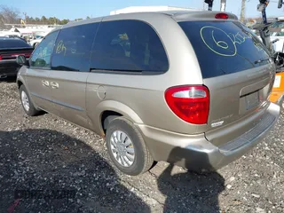 2003 Dodge Caravan Sport with VIN 2D4GP44R13R274458, listed as a IAAI auction lot 41788865 with 999,999 mi miles. Bid and sale history available at carsss.com. Image 3.