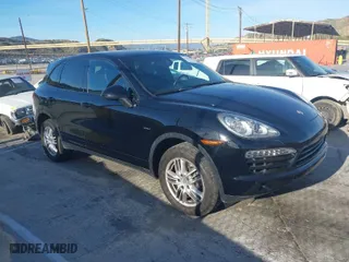 2014 Porsche Cayenne Diesel with VIN WP1AF2A20ELA35222, listed as a IAAI auction lot 41860957 with 124,530 mi miles. Bid and sale history available at carsss.com. Image 1.