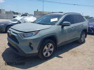 2020 Toyota RAV4 XLE with VIN 2T3W1RFV0LW069849, listed as a IAAI auction lot 42138074 with 112,062 mi miles and . Bid and sale history available at DreamBid. Image 2.
