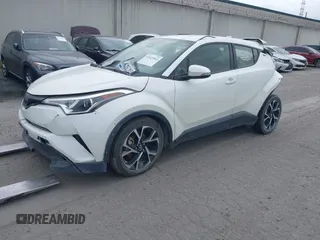 2019 Toyota C-HR XLE z VIN JTNKHMBX3K1029701, wystawiony jako IAAI lot #42023964 z przebiegiem 83 055 mil mil oraz . Historia ofert i sprzedaży dostępna na DreamBid. Obrazek 2.