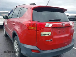 2015 Toyota RAV4 LE with VIN 2T3BFREV0FW249662, listed as a IAAI auction lot 42333319 with 128,030 mi miles and . Bid and sale history available at DreamBid. Image 3.