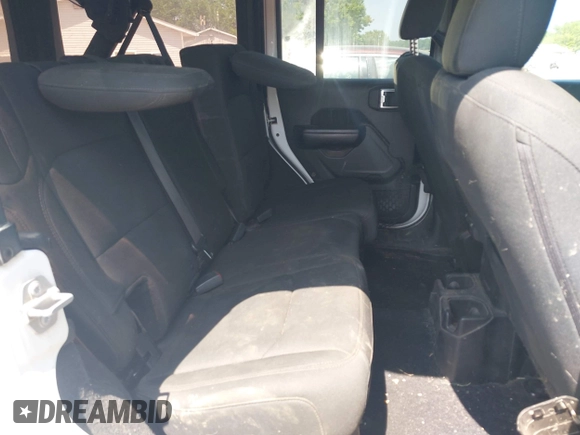 2018 Jeep Wrangler Unlimited Sport S with VIN 1C4HJXDGXJW146873, listed as a IAAI auction lot 42404813 with 73,929 mi miles and . Bid and sale history available at DreamBid. Image 8.