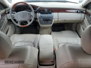 2002 Cadillac DeVille DHS z VIN 1G6KE57Y42U277428, wystawiony jako Copart lot #45757115 z przebiegiem 143 741 mil mil oraz Czysty tytuł • Clean title. Historia ofert i sprzedaży dostępna na DreamBid. Obrazek 8.