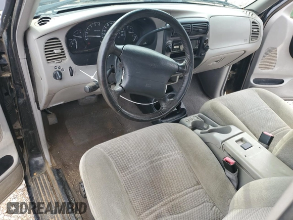 2000 Ford Ranger XLT with VIN 1FTZR15X4YPA74632, listed as a Copart auction lot 58438345 with 139,703 mi miles and Salvage title. Bid and sale history available at DreamBid. Image 8.