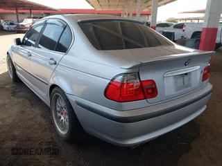 2002 BMW 3 Series 330i with VIN WBAEV53422KM20771, listed as a IAAI auction lot 42703688 with 180,402 mi miles and . Bid and sale history available at DreamBid. Image 3.