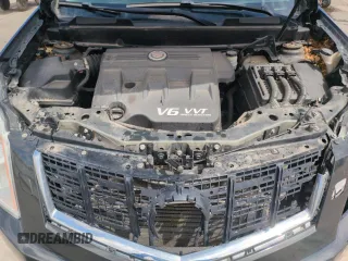 2014 Cadillac SRX Premium Collection z VIN 3GYFNGE34ES676646, wystawiony jako Copart lot #53478695 z przebiegiem 115 096 mil mil oraz Szkoda całkowita • Salvage title. Historia ofert i sprzedaży dostępna na DreamBid. Obrazek 12.