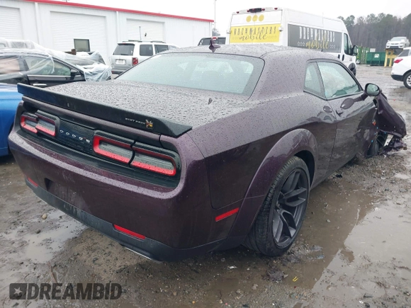 2021 Dodge Challenger R/T Scat Pack z VIN 2C3CDZFJ2MH586535, wystawiony jako IAAI lot #41224949 z przebiegiem 32 977 mil mil oraz . Historia ofert i sprzedaży dostępna na DreamBid. Obrazek 4.