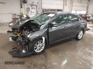 2016 Ford Focus SE with VIN 1FADP3F21GL247906, listed as a IAAI auction lot 42043546 with 124,532 mi miles and . Bid and sale history available at DreamBid. Image 2.