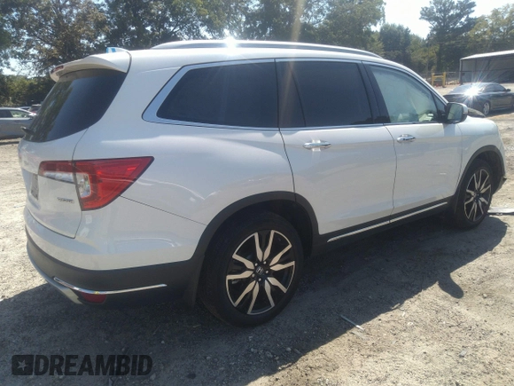 2019 Honda Pilot Touring 8-Passenger with VIN 5FNYF5H91KB038679, listed as a IAAI auction lot 40200012 with 70,582 mi miles. Bid and sale history available at carsss.com. Image 4.