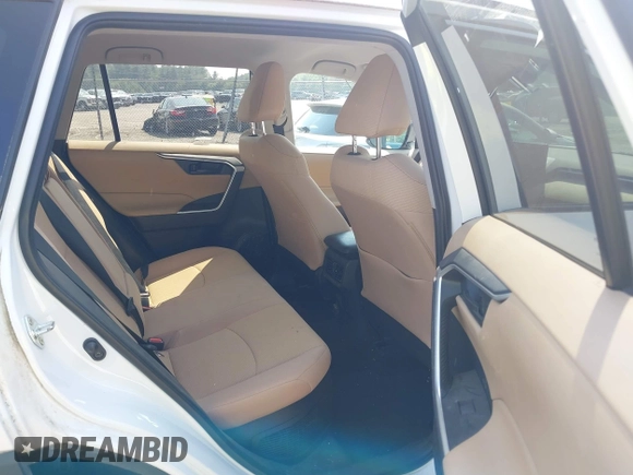 2019 Toyota RAV4 Hybrid LE with VIN 2T3LWRFV0KW024848, listed as a IAAI auction lot 42490933 with 48,384 mi miles and . Bid and sale history available at DreamBid. Image 8.