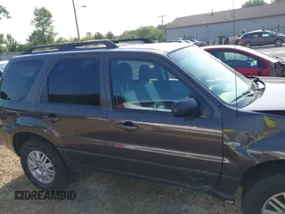 2006 Mercury Mariner Luxury with VIN 4M2YU56196KJ20438, listed as a IAAI auction lot 42394996 with 164,564 mi miles and . Bid and sale history available at DreamBid. Image 14.