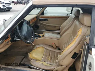 1994 Jaguar XJS with VIN SAJNX2749RC191243, listed as a Copart auction lot 76037994 with 74,842 mi miles and Salvage Title. Bid and sale history available at carsss.com. Image 7.