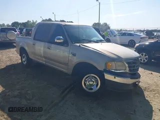 2001 Ford F-150 XLT z VIN 1FTRW07W11KD96140, wystawiony jako IAAI lot #42331842 z przebiegiem Nie podano mil oraz . Historia ofert i sprzedaży dostępna na DreamBid. Obrazek 1.