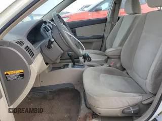 2006 Kia Spectra EX with VIN KNAFE121265208526, listed as a Copart auction lot 80300604 with 101,780 mi miles and Salvage Title. Bid and sale history available at carsss.com. Image 7.