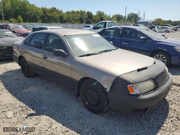 1999 Toyota Avalon XL with VIN 4T1BF18B2XU299587, listed as a Copart auction lot 43240545 with NaN miles and Salvage Title. Bid and sale history available at carsss.com. Image 4.