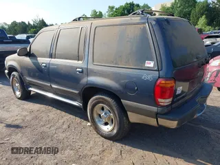 1999 Ford Explorer XL z VIN 1FMZU34XXXUB25039, wystawiony jako IAAI lot #42290828 z przebiegiem 146 874 mil mil oraz . Historia ofert i sprzedaży dostępna na DreamBid. Obrazek 3.