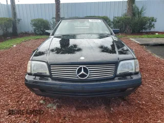 1997 Mercedes-Benz SL-Class with VIN WDBFA67F3VF147355, listed as a Copart auction lot 74295594 with 0 mi miles and Salvage Title. Bid and sale history available at carsss.com. Image 5.