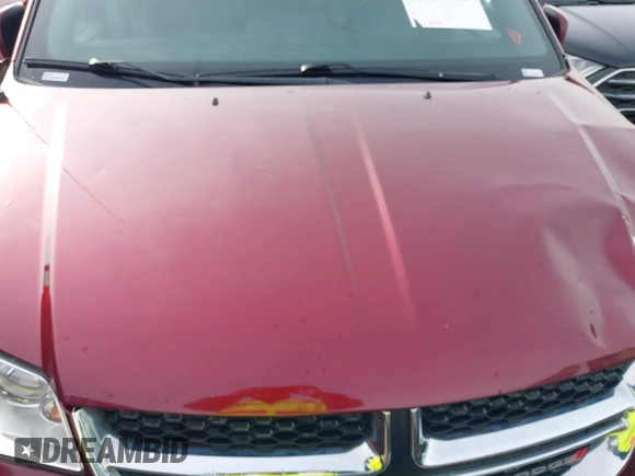 2019 Dodge Grand Caravan SXT with VIN 2C4RDGCG9KR678235, listed as a IAAI auction lot 41864931 with 127,848 mi miles and . Bid and sale history available at DreamBid. Image 18.