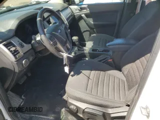 2023 Ford Ranger XL with VIN 1FTER4FH9PLE12457, listed as a Copart auction lot 52674865 with 51,417 mi miles and Salvage title. Bid and sale history available at DreamBid. Image 7.