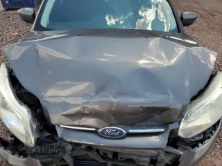 2012 Ford Focus SE z VIN 1FAHP3K24CL338153, wystawiony jako Copart lot #56161925 z przebiegiem 167 146 mil mil oraz Szkoda całkowita • Salvage title. Historia ofert i sprzedaży dostępna na DreamBid. Obrazek 11.