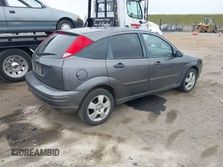 2007 Ford Focus S z VIN 1FAFP37N07W343784, wystawiony jako IAAI lot #42036642 z przebiegiem 223 104 mil mil oraz . Historia ofert i sprzedaży dostępna na DreamBid. Obrazek 4.