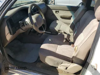 1999 Toyota Tacoma z VIN 4TAVL52N1XZ513889, wystawiony jako Copart lot #50007235 z przebiegiem 225 799 mil mil oraz Szkoda całkowita • Salvage title. Historia ofert i sprzedaży dostępna na DreamBid. Obrazek 7.