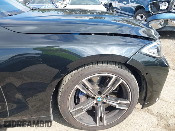 2023 BMW 4 Series M440i with VIN WBA53AT09PCL49954, listed as a IAAI auction lot 41478951 with 27,105 mi miles and . Bid and sale history available at DreamBid. Image 18.