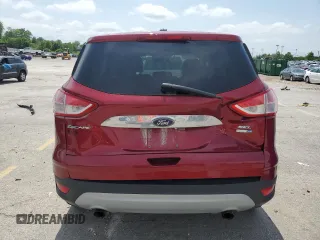 2013 Ford Escape SEL with VIN 1FMCU9H96DUD80433, listed as a Copart auction lot 55514195 with 195,781 mi miles and Salvage title. Bid and sale history available at DreamBid. Image 6.