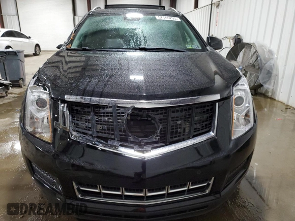2014 Cadillac SRX Luxury Collection z VIN 3GYFNEE39ES681183, wystawiony jako Copart lot #57165295 z przebiegiem 110 780 mil mil oraz Szkoda całkowita • Salvage title. Historia ofert i sprzedaży dostępna na DreamBid. Obrazek 5.