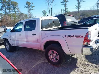 2014 Toyota Tacoma with VIN 5TFLU4EN1EX103052, listed as a IAAI auction lot 41653270 with 121,656 mi miles. Bid and sale history available at carsss.com. Image 14.