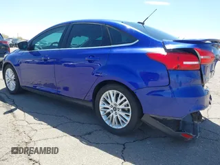2015 Ford Focus Titanium with VIN 1FADP3J25FL314903, listed as a IAAI auction lot 42053132 with 125,418 mi miles and . Bid and sale history available at carsss.com. Image 3.