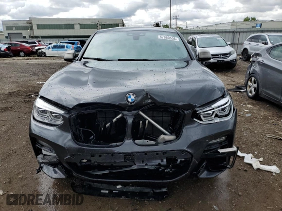 2021 BMW X4 M40i z VIN 5UX2V5C0XM9F04867, wystawiony jako Copart lot #57890555 z przebiegiem 40 563 mil mil oraz Szkoda całkowita • Salvage title. Historia ofert i sprzedaży dostępna na DreamBid. Obrazek 5.