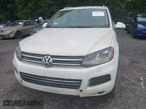 2011 Volkswagen Touareg Sport z VIN WVGFF9BPXBD006399, wystawiony jako IAAI lot #42436074 z przebiegiem 134 075 mil mil oraz . Historia ofert i sprzedaży dostępna na DreamBid. Obrazek 6.