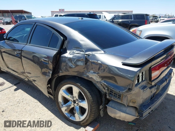 2014 Dodge Charger SXT z VIN 2C3CDXHG3EH339404, wystawiony jako IAAI lot #42072957 z przebiegiem 125 183 mil mil oraz . Historia ofert i sprzedaży dostępna na DreamBid. Obrazek 6.