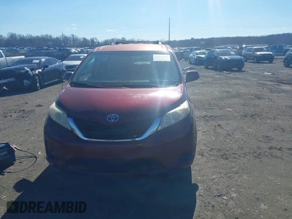 2012 Toyota Sienna LE AAS with VIN 5TDKK3DCXCS244605, listed as a IAAI auction lot 41516400 with 186,198 mi miles. Bid and sale history available at carsss.com. Image 12.